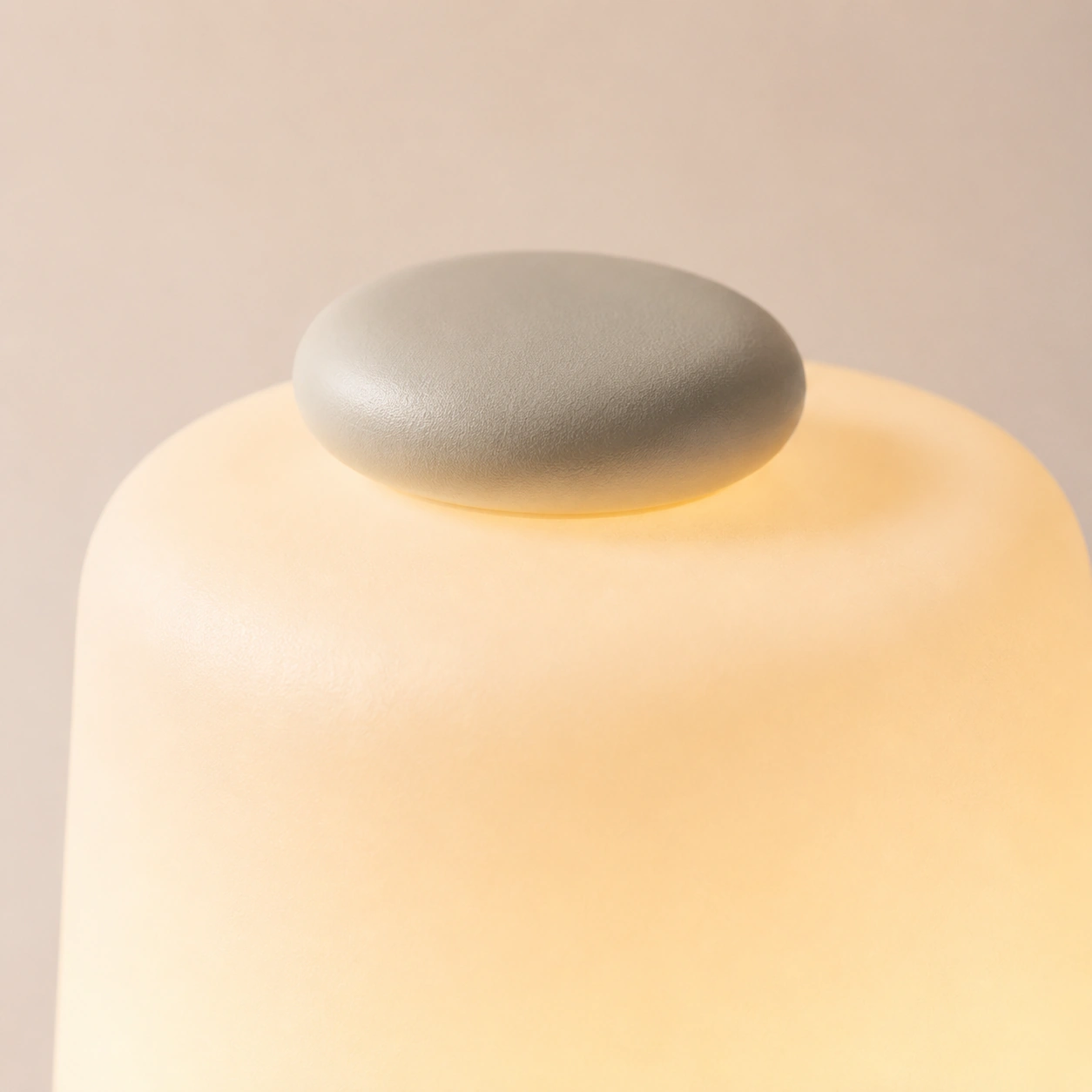 Hatch Baby Big Button style control detail with soft nursery light