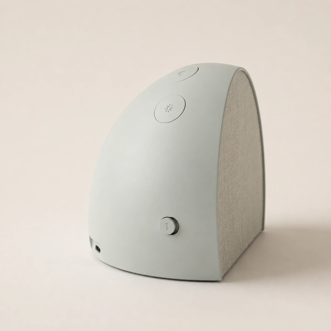 Side profile studio view of Hatch Restore 2 Smart Sound Machine Alarm Clock