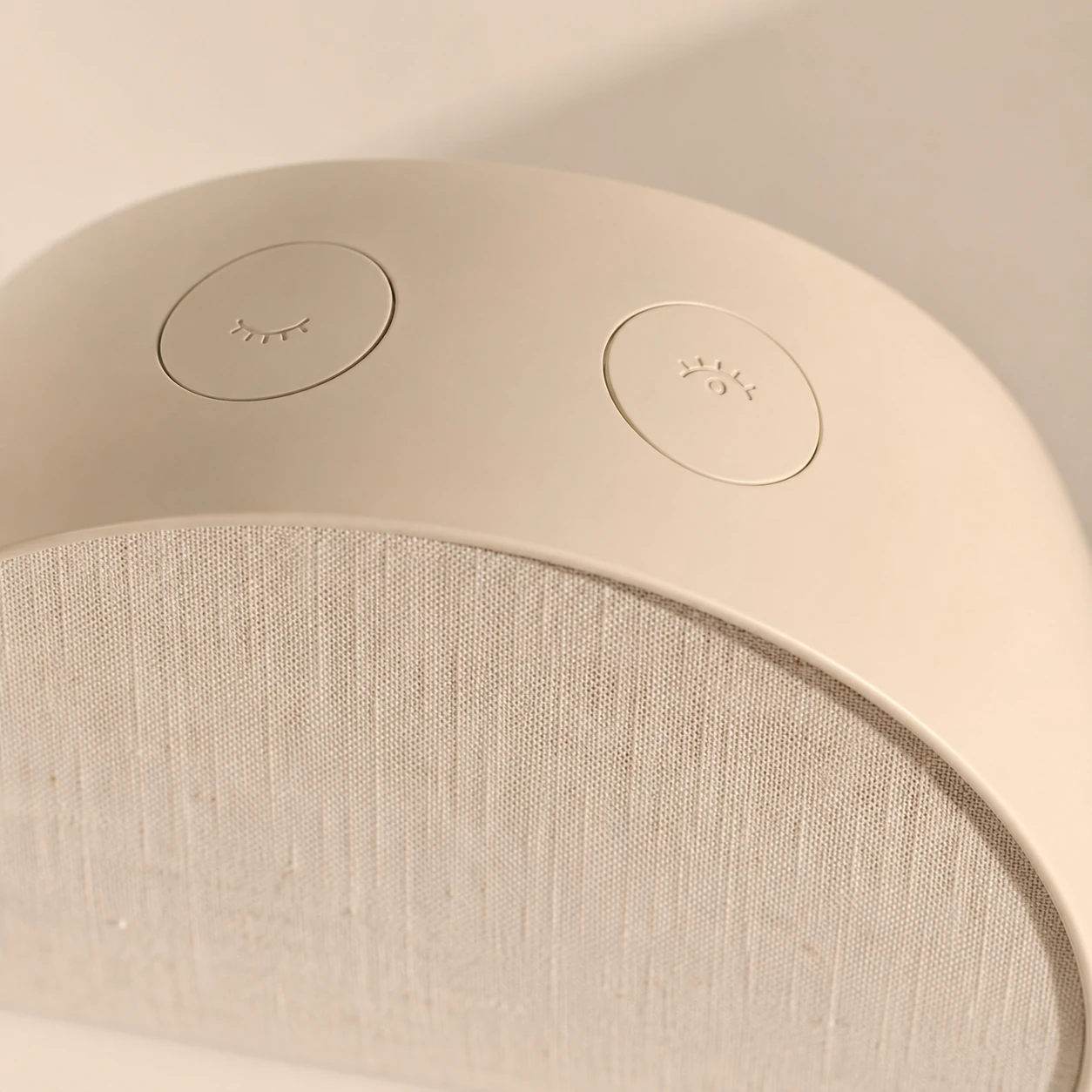 Macro detail of Hatch Restore 2 top buttons and fabric front finish