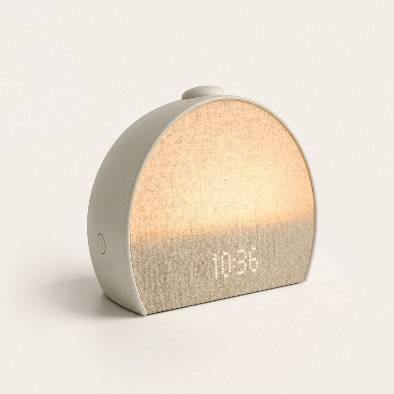 Hatch Restore 3 Smart Sunrise Alarm Clock front product shot with fabric face and warm light
