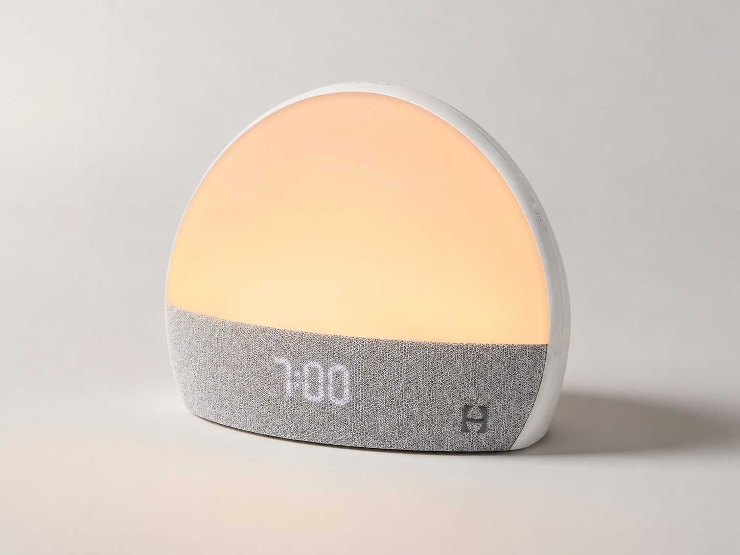 Hatch Restore Smart Alarm Clock studio product shot with soft warm light
