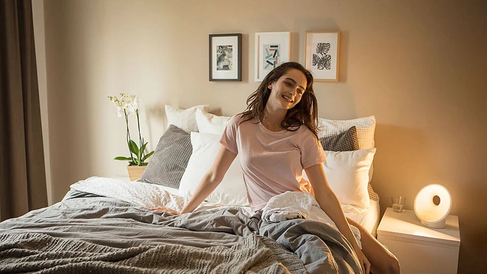 Exact Philips HF3650/60 illuminating a bedroom in an official sunrise scene